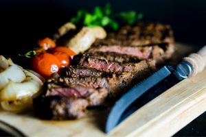 grilled steak near steak knife